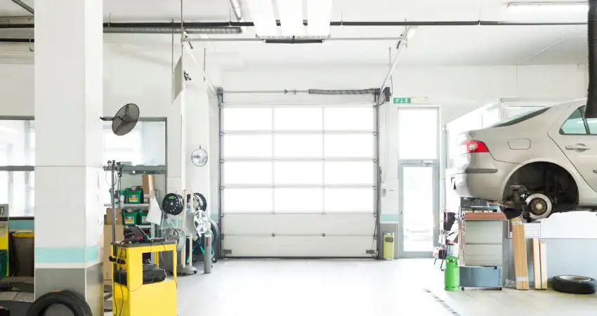 motor garage space with glass garage door