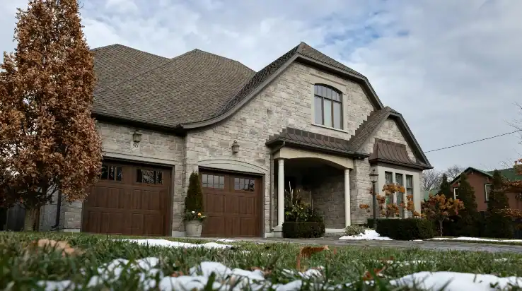 house with wood garage doors