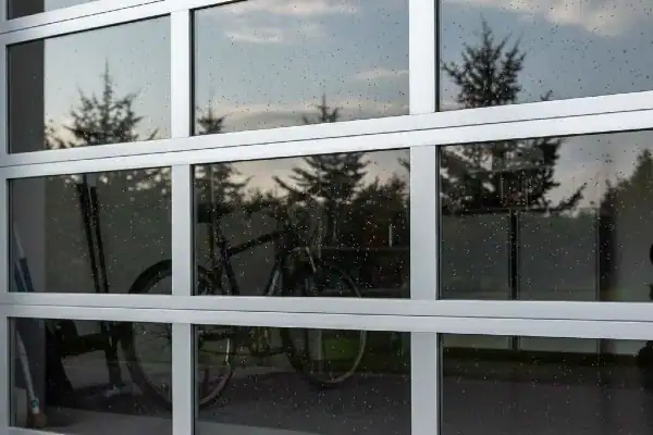 glass garage door with a metal frame