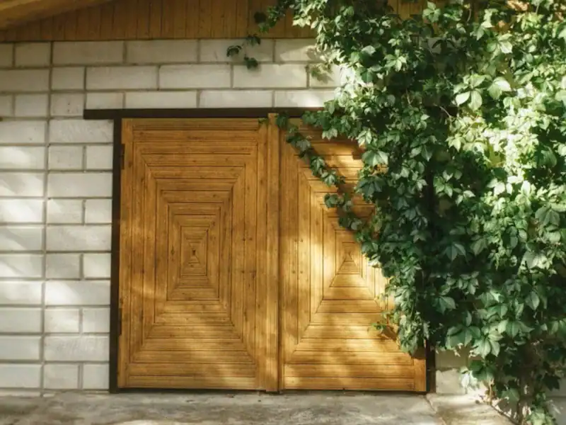 A luxury home with a wooden garage door