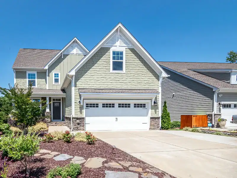 Residential garage door maintained for smooth and safe operation